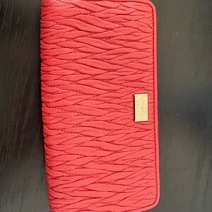 Coach coral Textured Accessory with Gold Detail